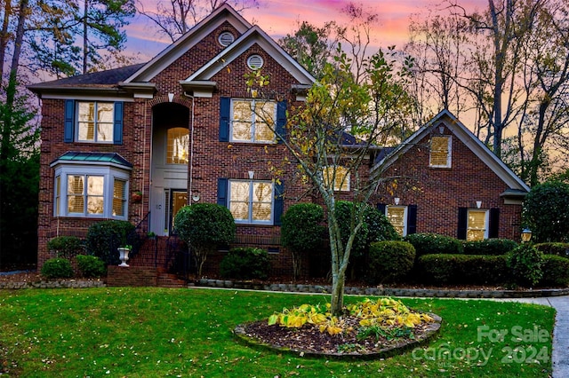 view of property with a lawn