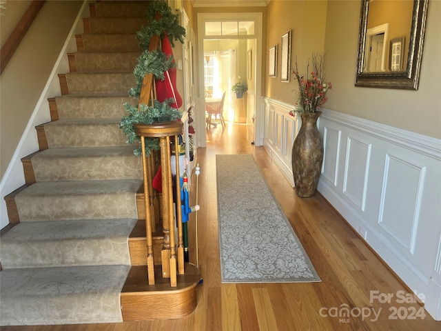 staircase featuring hardwood / wood-style floors