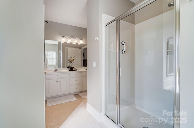 bathroom with vanity and an enclosed shower