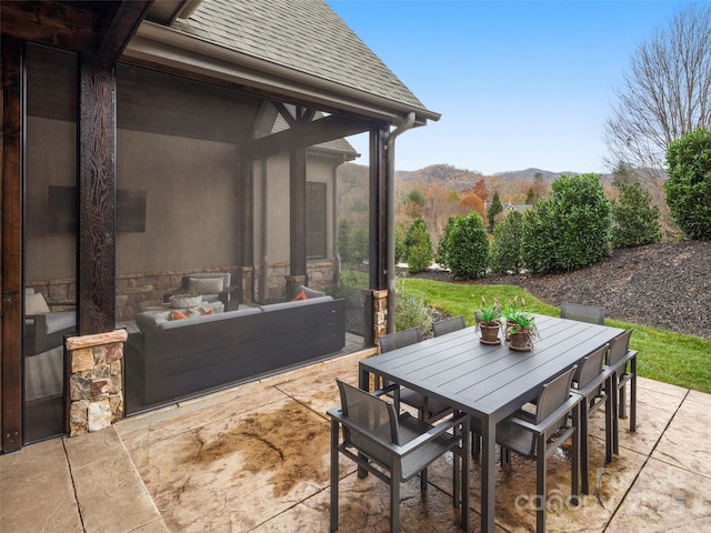 9 Haverhill Way, Arden, NC 28704 - view of patio with a mountain view, outdoor dining area, an outdoor living space, and a sunroom
