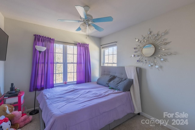 bedroom featuring carpet and ceiling fan