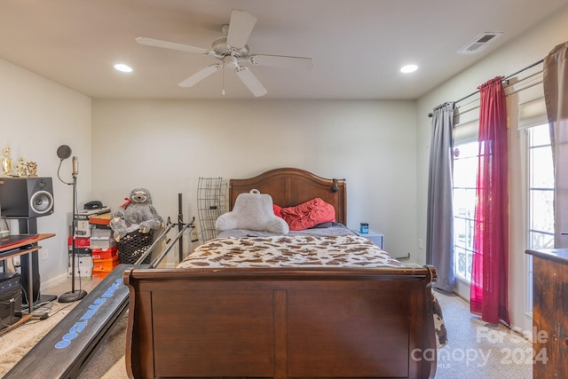 carpeted bedroom with ceiling fan