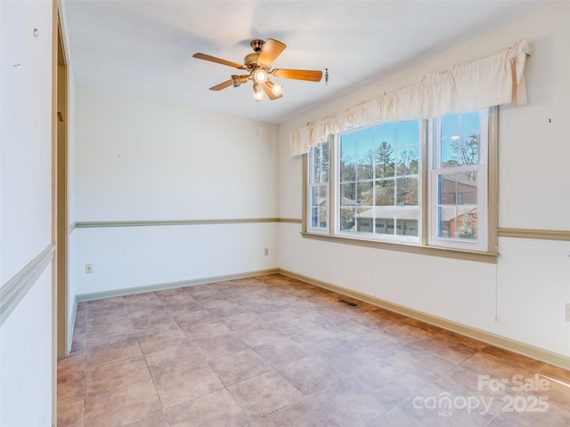 spare room featuring ceiling fan