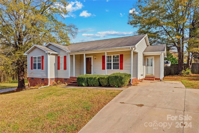 ranch-style house with a front yard