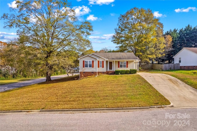 view of front of home with a front yard