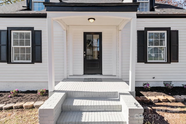 property entrance with a porch