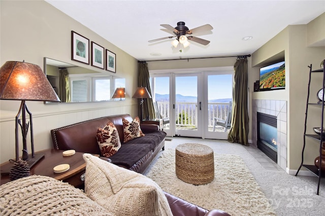 510 Elderberry Ridge Rd Unit E101, Banner Elk, NC 28604 - carpeted living area featuring a fireplace and a ceiling fan