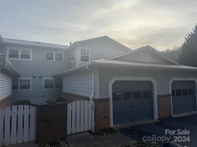 view of front of home with a garage