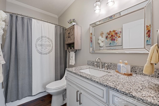 bathroom with vanity, crown molding, toilet, a textured ceiling, and wood-type flooring