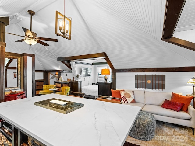 kitchen with ceiling fan and vaulted ceiling