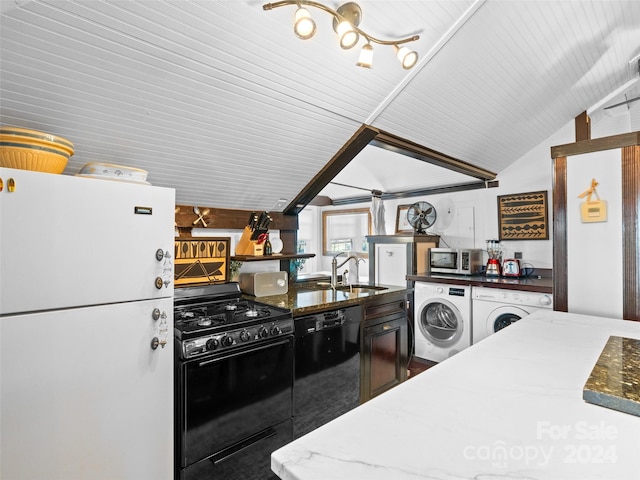 kitchen featuring black appliances, lofted ceiling with beams, independent washer and dryer, and sink