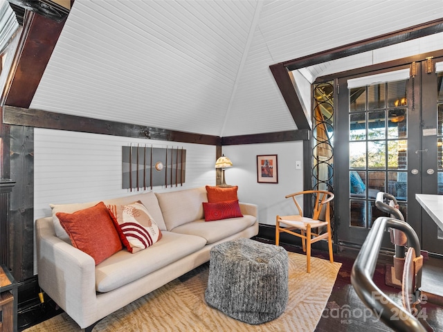 living room featuring hardwood / wood-style flooring and lofted ceiling