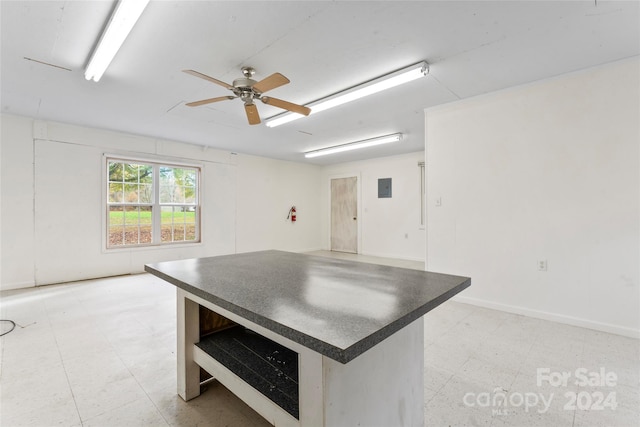 kitchen featuring ceiling fan