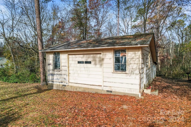 view of outdoor structure with a garage