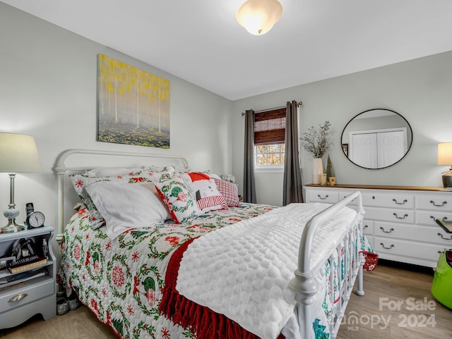 bedroom featuring hardwood / wood-style floors