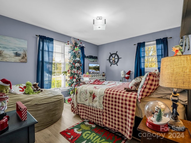 bedroom with light hardwood / wood-style floors