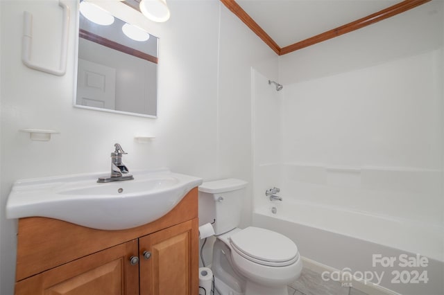 full bathroom featuring vanity, bathing tub / shower combination, toilet, and ornamental molding