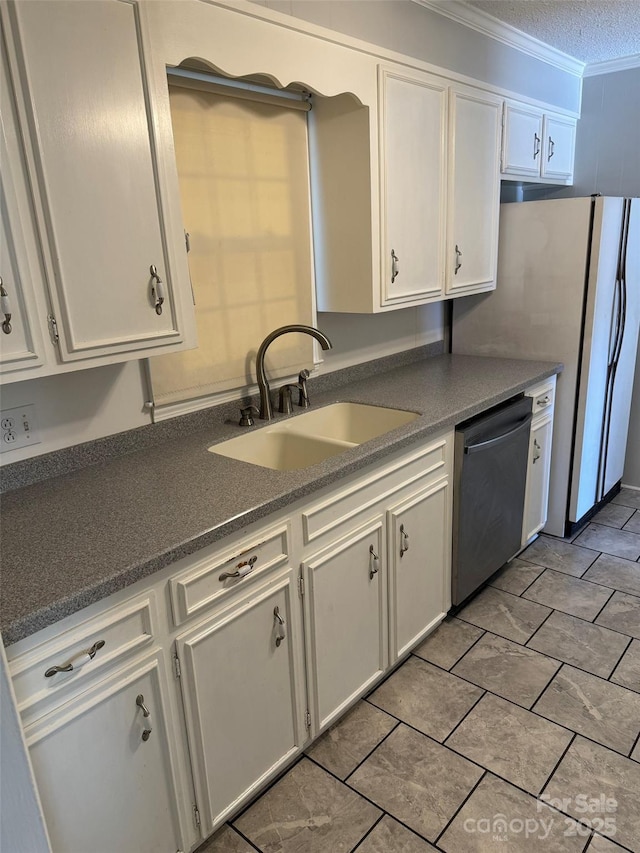 kitchen with dishwasher, white cabinets, crown molding, sink, and a textured ceiling