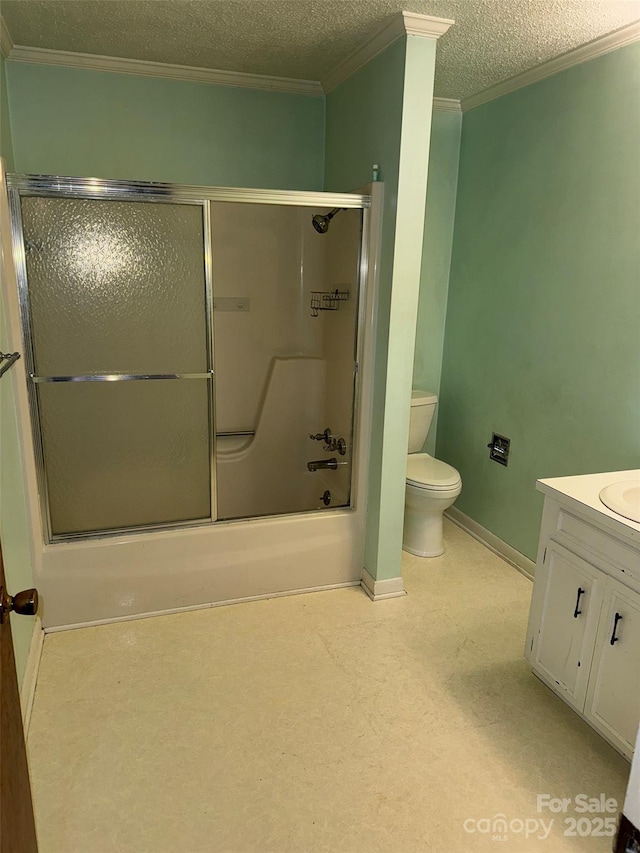 full bathroom featuring vanity, a textured ceiling, toilet, and enclosed tub / shower combo