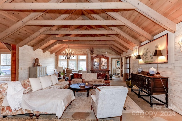 living room featuring lofted ceiling with beams, plenty of natural light, and wood ceiling