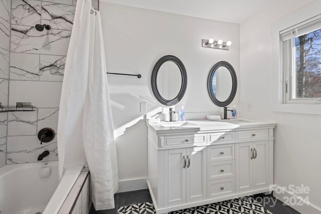 bathroom with vanity and shower / tub combo