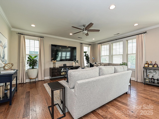 living room featuring crown molding, ceiling fan, and dark wood-type flooring