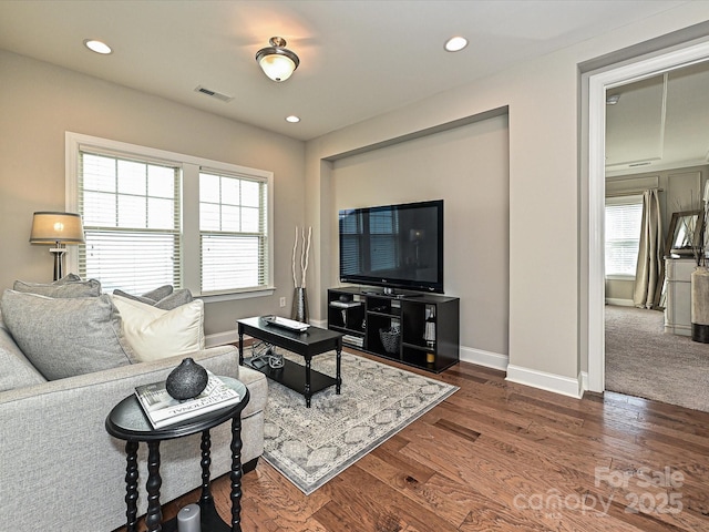 living room featuring dark hardwood / wood-style flooring