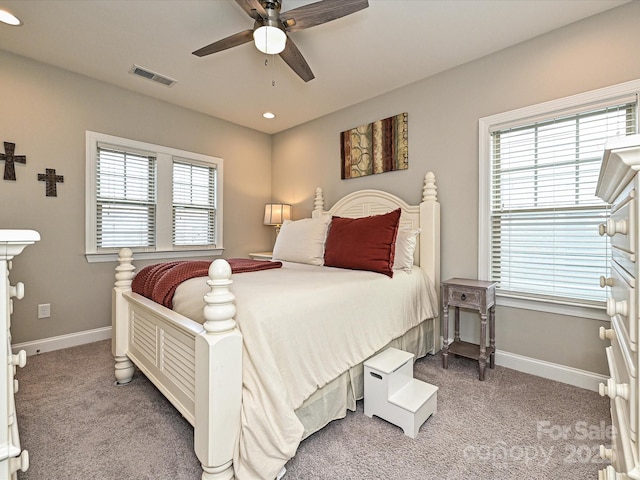 carpeted bedroom featuring ceiling fan