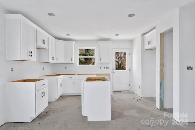 kitchen with white cabinets and a kitchen island