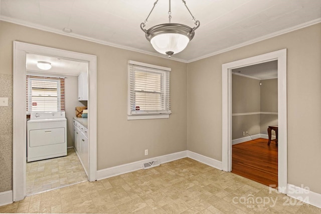 unfurnished dining area with ornamental molding, washer / clothes dryer, and light hardwood / wood-style flooring