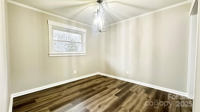 unfurnished dining area with ornamental molding, hardwood / wood-style floors, and a notable chandelier