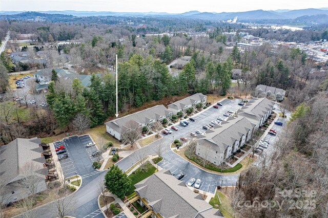 drone / aerial view with a residential view and a mountain view