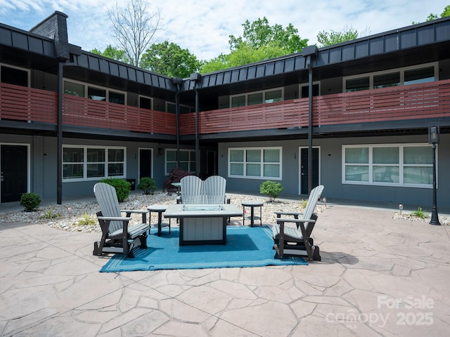 view of patio / terrace with a balcony