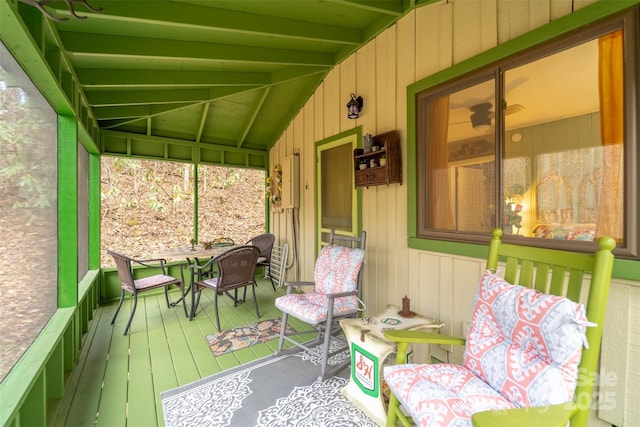 sunroom / solarium with lofted ceiling