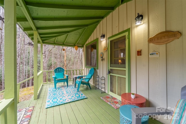 wooden deck featuring covered porch