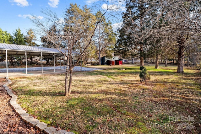 view of yard with a carport