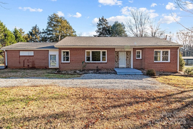 ranch-style house with a front yard