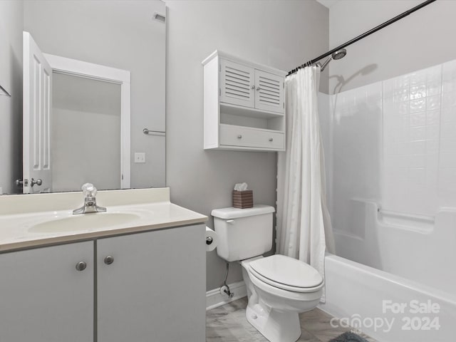 full bathroom featuring vanity, shower / tub combo, and toilet