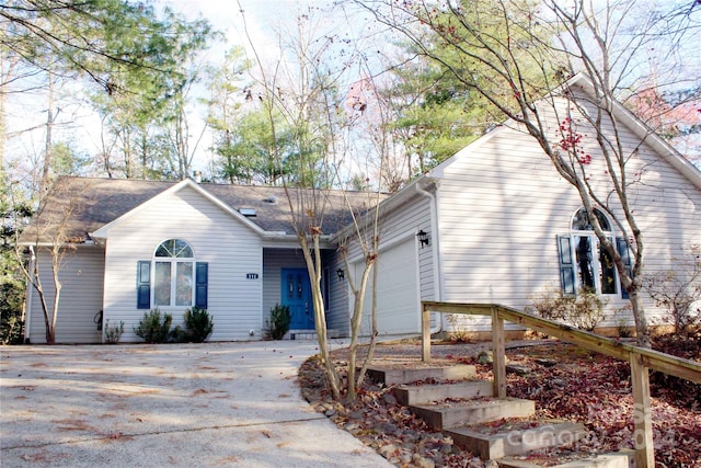 single story home with a garage