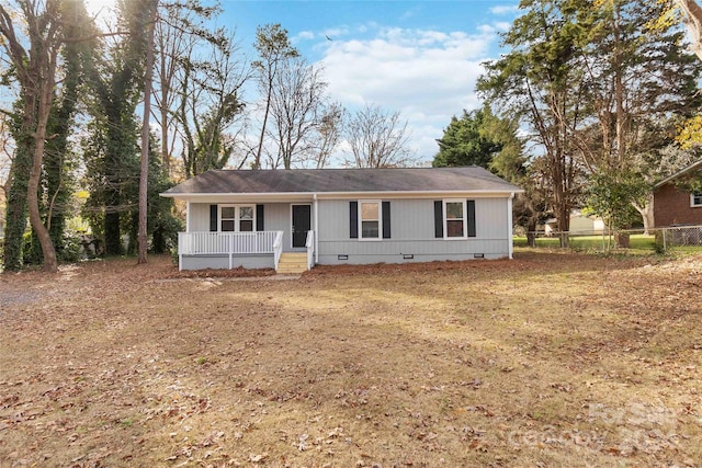 single story home with covered porch