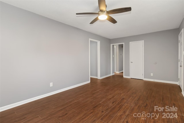 interior space featuring dark hardwood / wood-style flooring and ceiling fan