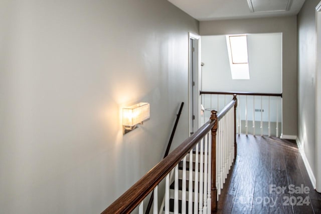 corridor featuring dark wood-type flooring