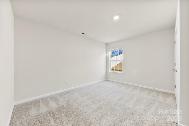 view of carpeted spare room