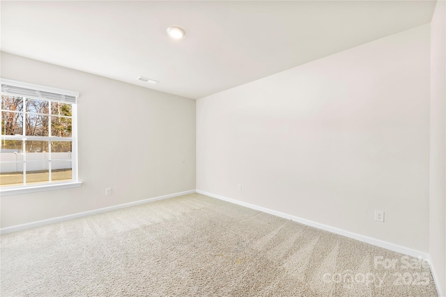 empty room with carpet floors