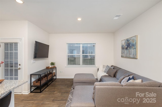 living room with dark wood-type flooring