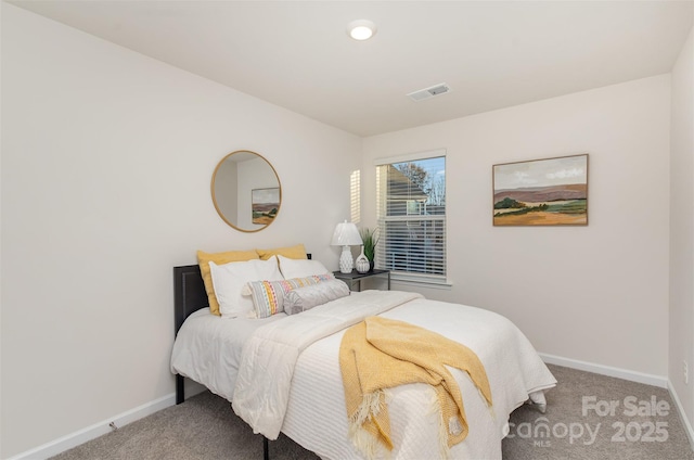 bedroom featuring carpet