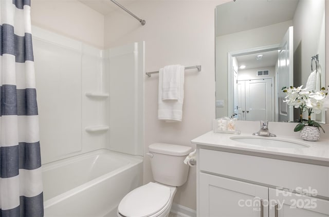 full bathroom with vanity, toilet, and shower / bath combo with shower curtain