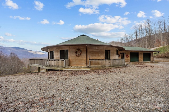 ranch-style house with a mountain view