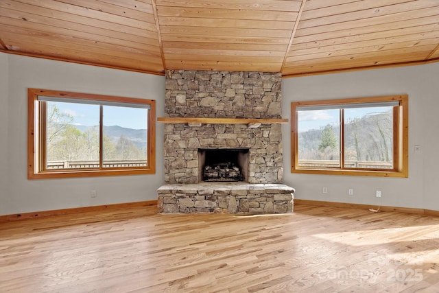 417 Quiet Forest Ln, Sylva, NC 28779 - unfurnished living room with baseboards, wooden ceiling, wood finished floors, and plenty of natural light
