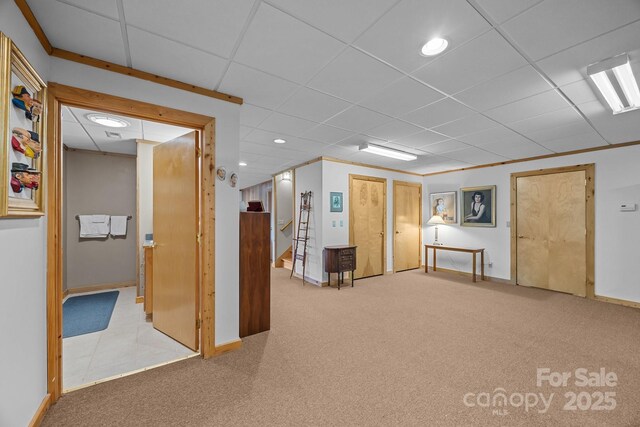 417 Quiet Forest Ln, Sylva, NC 28779 - finished below grade area featuring baseboards, carpet, stairs, and a paneled ceiling